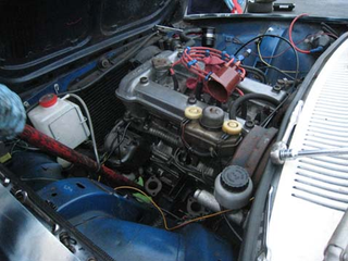 Illustration for article titled What Do You Do With Two Garbooned Alfetta Engines?